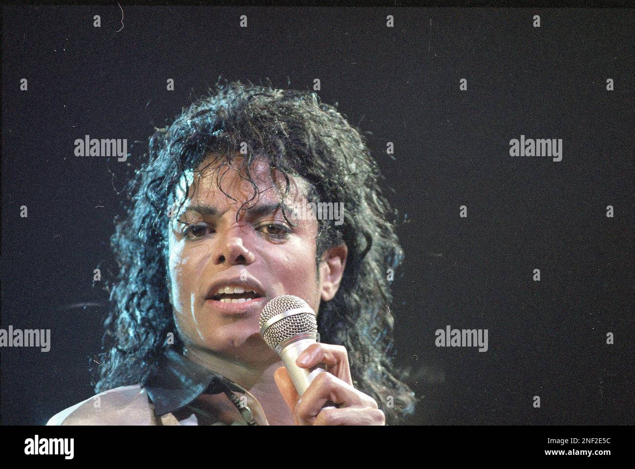 Pop superstar Michael Jackson performs to the crowd at New York's