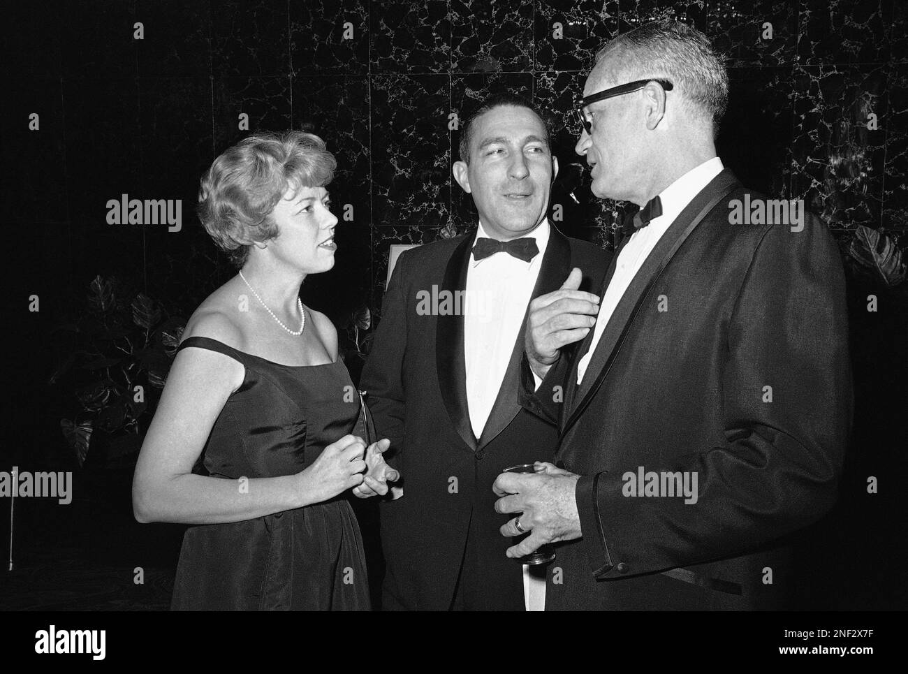 Secretary of Interior Stewart Udall, center, and his wife Ermalee, talk