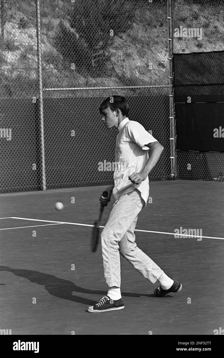 Jane Russell’s adopted child, Tom, 14 1/2, on one of the tennis courts
