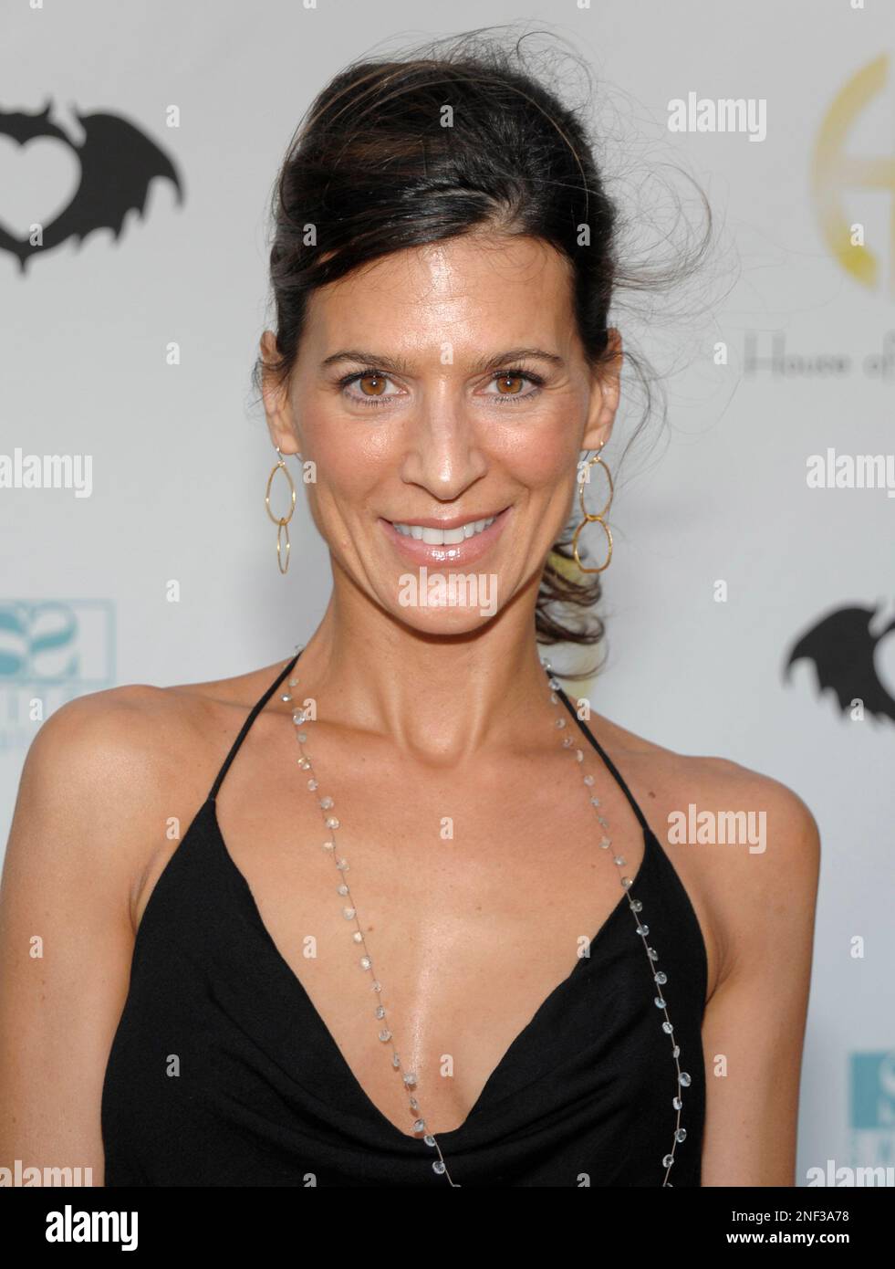 Actress Perry Reeves arrives at a fashion show for Nicole Richies