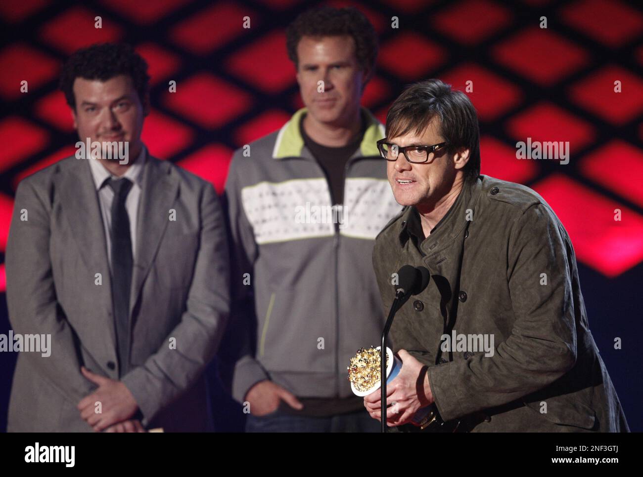 Jim Carrey accepts the award for best comedic performance for