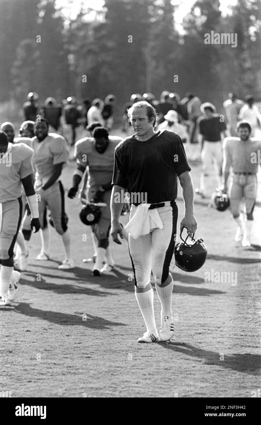 Pittsburgh quarterback Terry Bradshaw leads the team off the practice