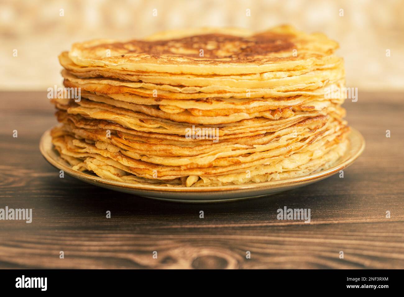 Delicious pancakes with chocolate sauce fresh blueberries on a rustic wooden table. Rustic brown table.  Stock Photo