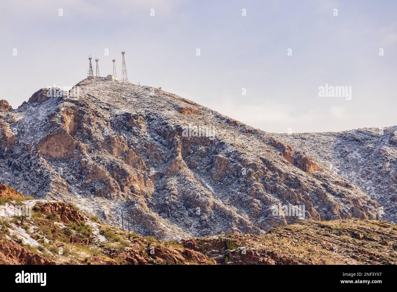 Sunny snowy landscape of Franklin Mountain at Texas Stock Photo