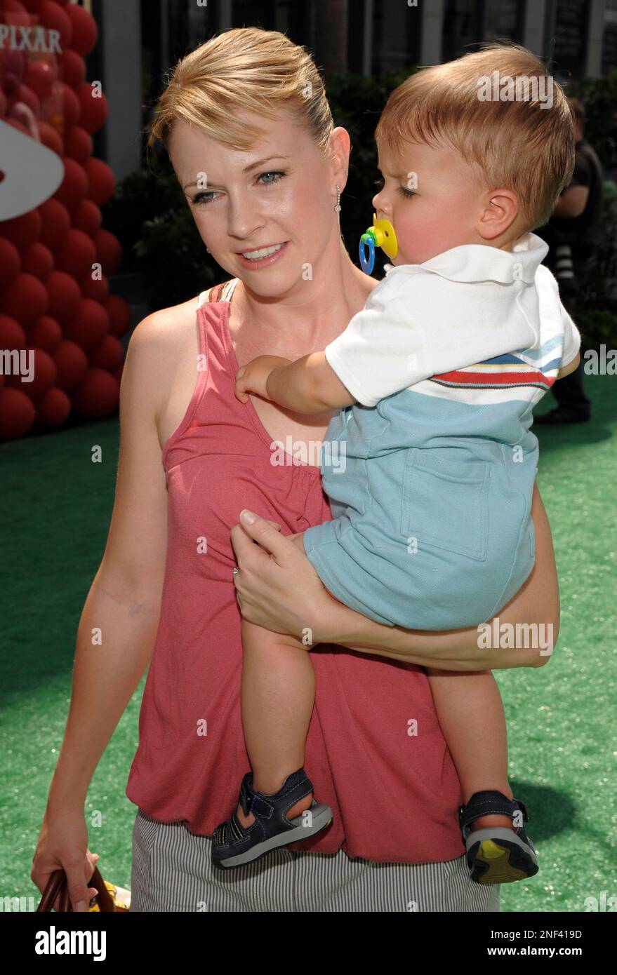 Actress Melissa Joan Hart, left, and son Brady Wilkerson arrive at the
