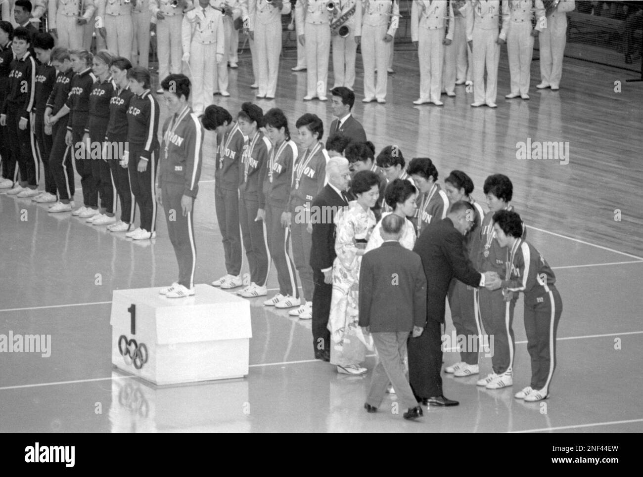Japan's players celebrate with their gold medals following an award