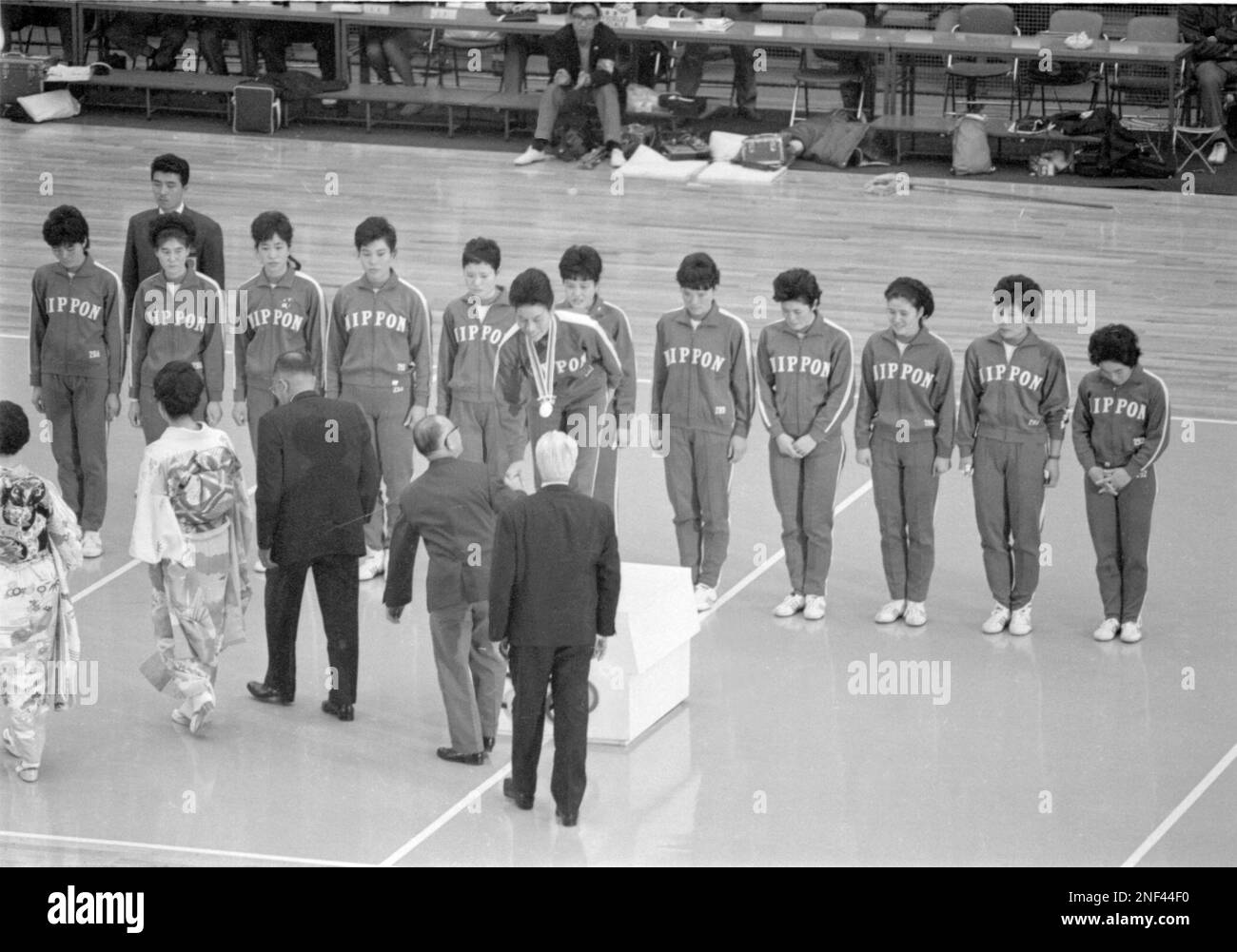 Japan's players celebrate with their gold medals following an award