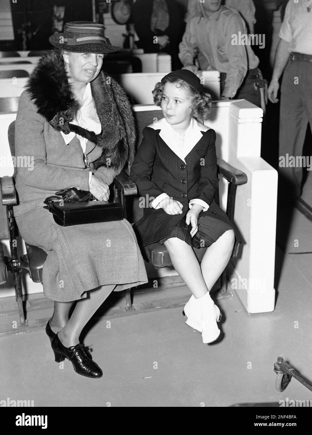 Mrs. Eleanor Roosevelt, first lady of the nation, and Shirley Temple