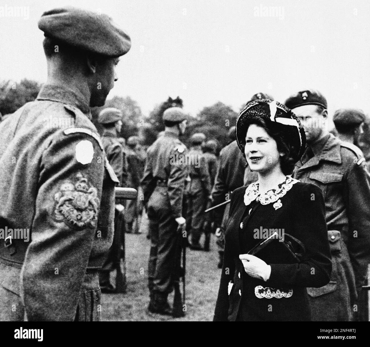 Princess Elizabeth Talks With A Sergeant Major During Her Inspection Of ...