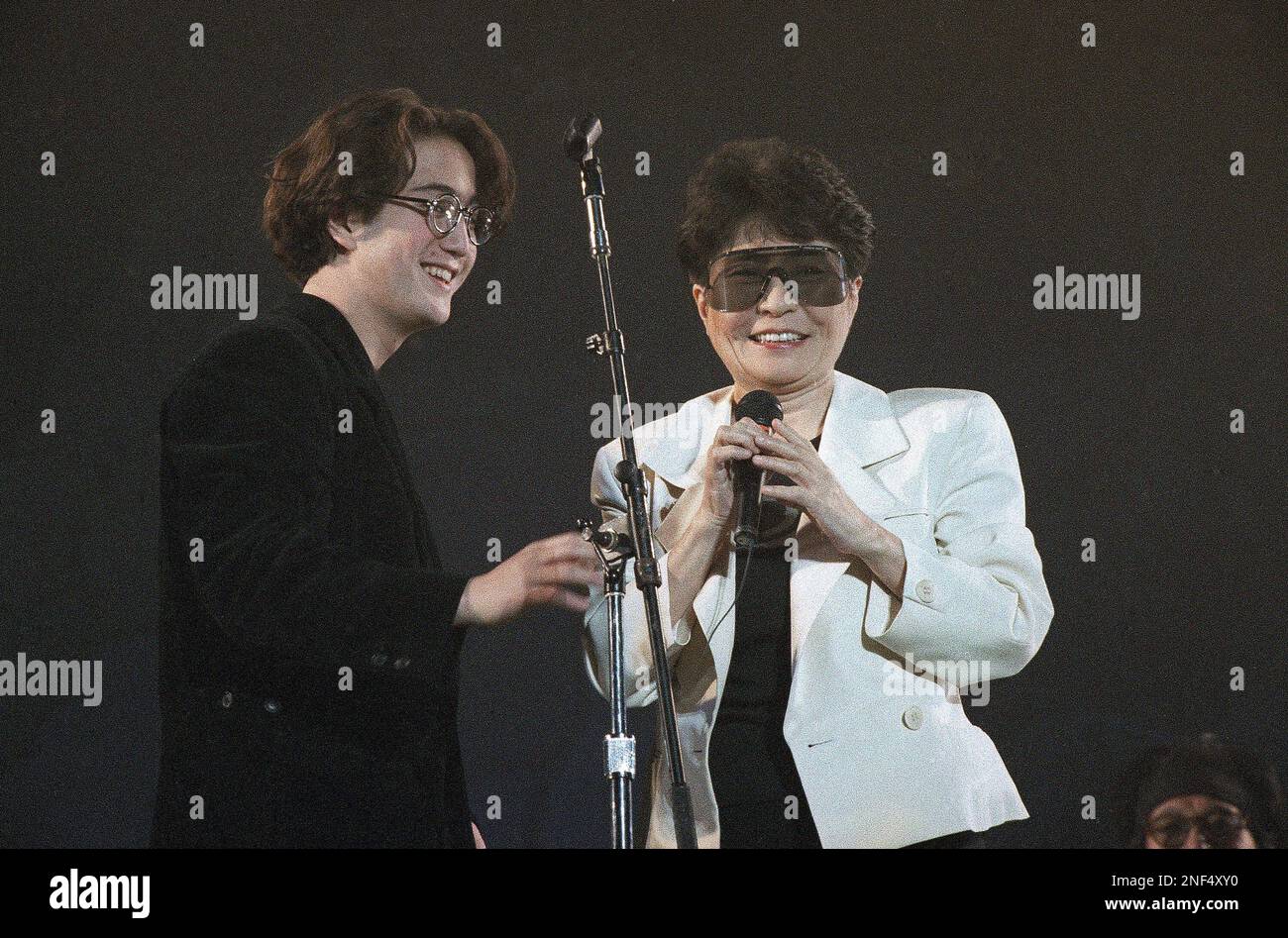 Yoko Ono and Sean Lennon, widow and a son of John Lennon, tell the audience  about John's life after the opening number \, image size:1300x947