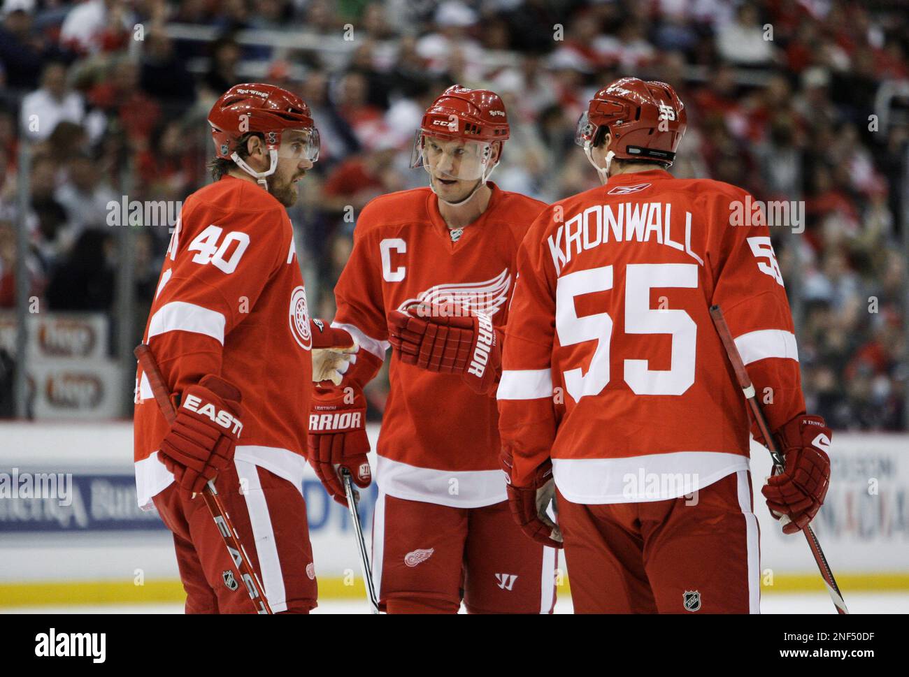 detroit-red-wings-henrik-zetterberg-40-nicklas-lidstrom-5-and-niklas-kronwall-55-all-of-sweden-talk-against-the-columbus-blue-jackets-in-the-first-period-of-a-first-round-nhl-hockey-playoff-game-in-detroit-thursday-april-16-2009-ap-photopaul-sancya-2NF50DF.jpg