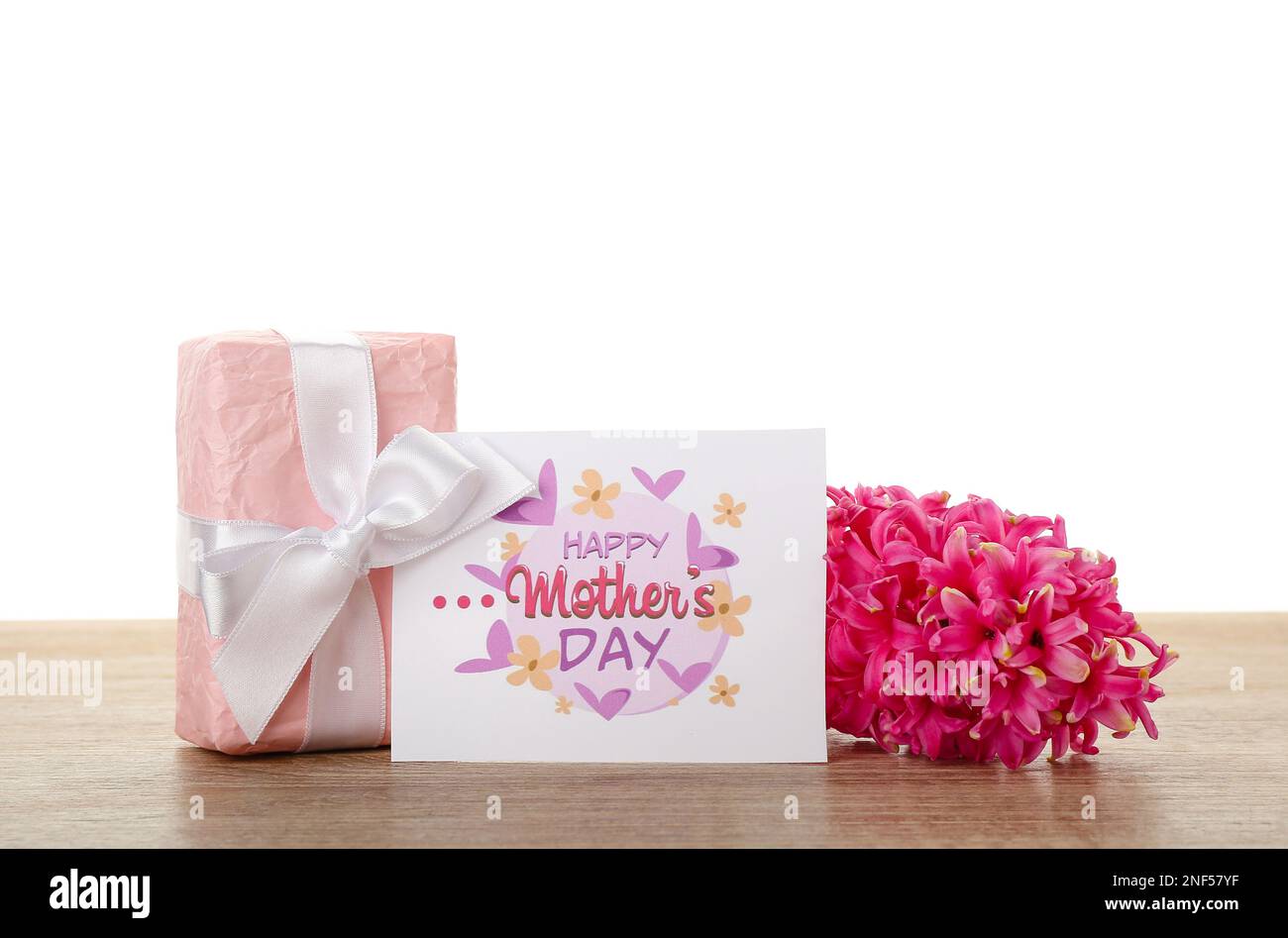Greeting card with text HAPPY MOTHER'S DAY, hyacinth flower and gift on ...
