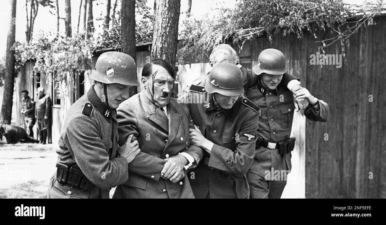 Swiss-American actor Billy Frick (center) is posing as the former ...