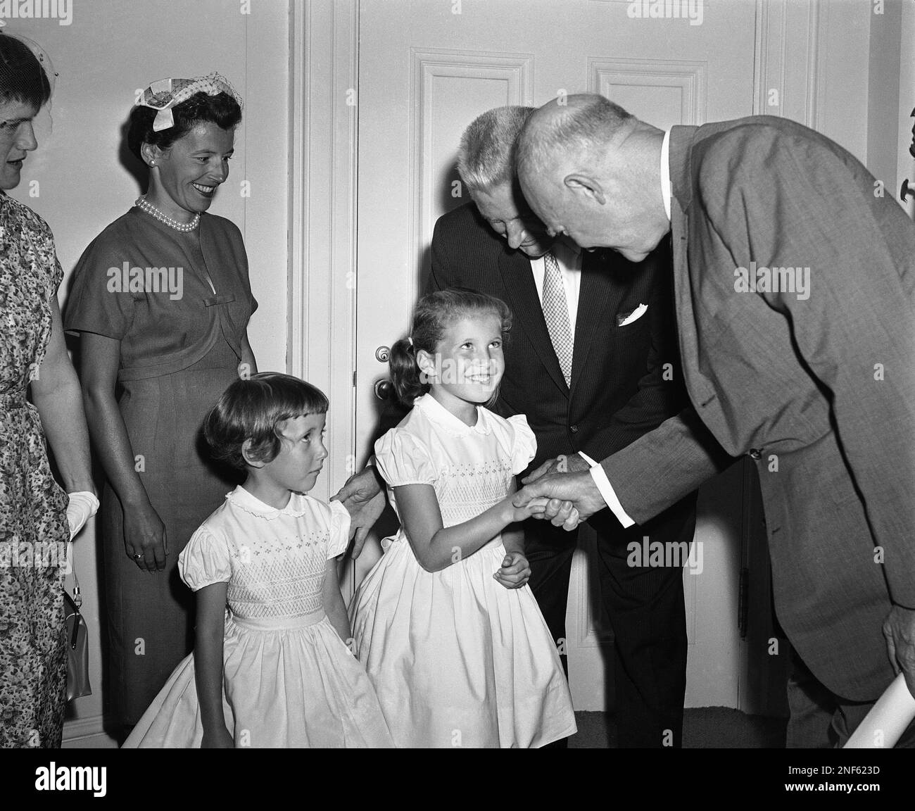 President Dwight D. Eisenhower meets Frederick H. Mueller's