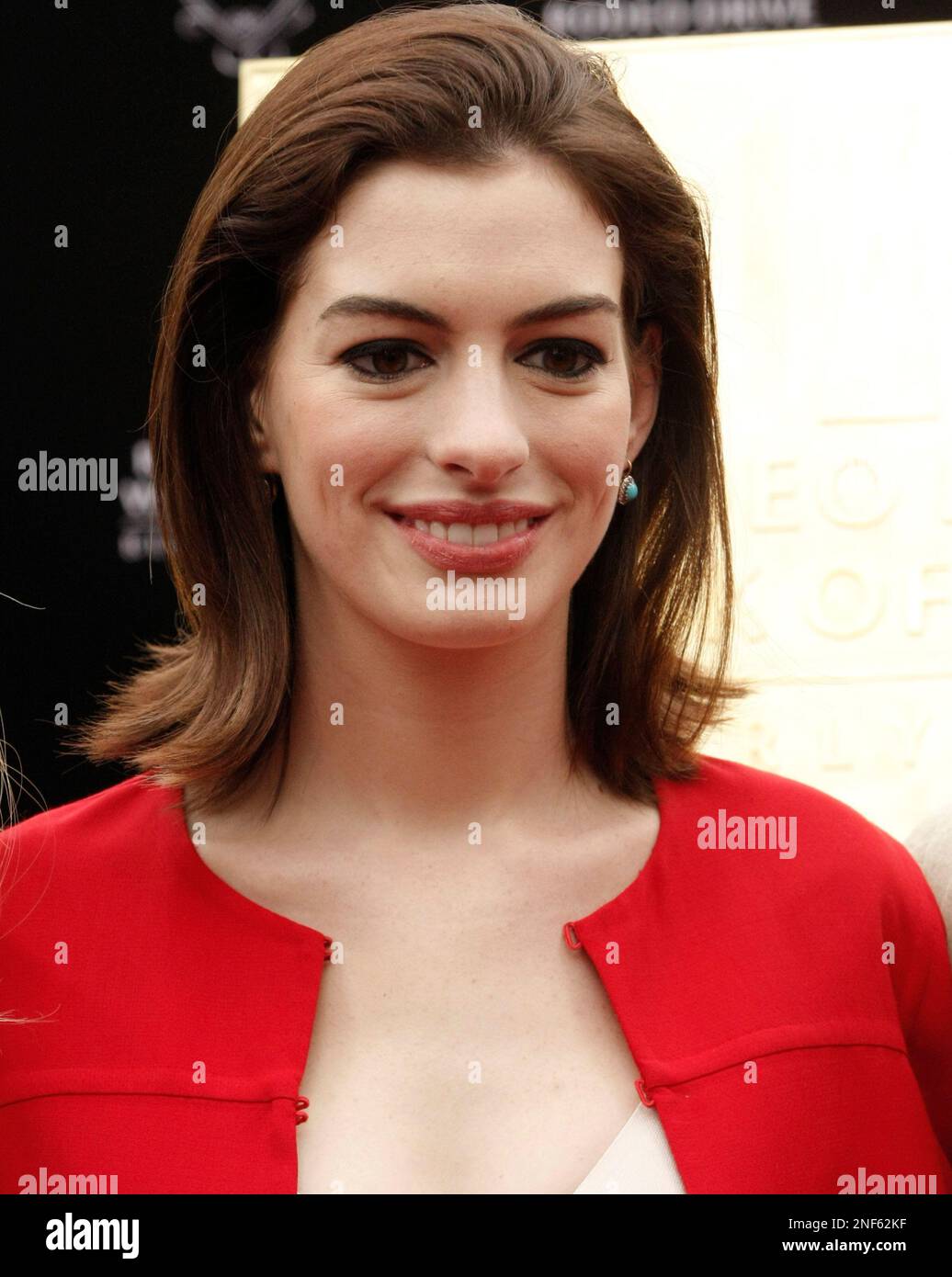 Actress Anne Hathaway poses at the Rodeo Drive Walk of Style Induction ...