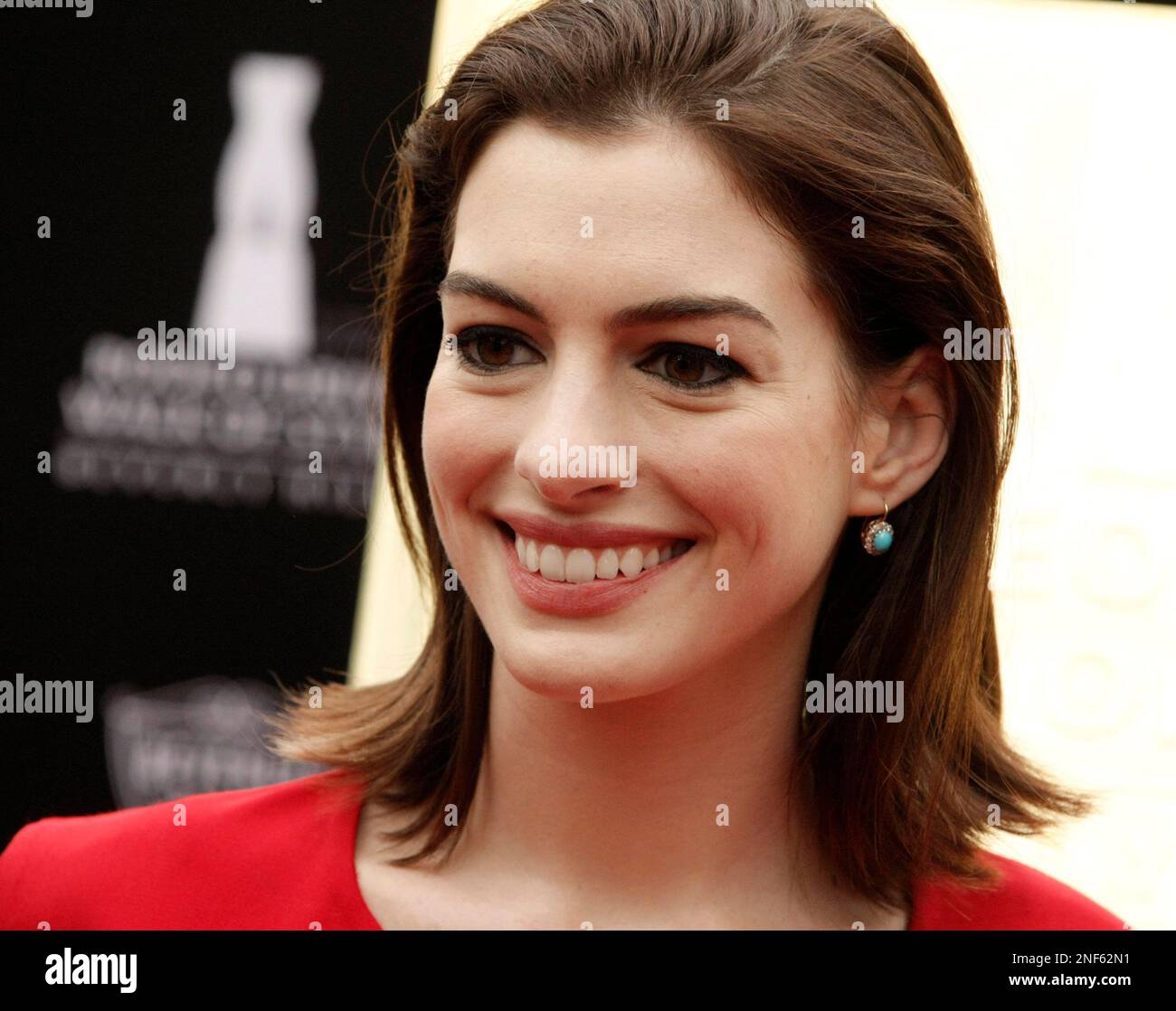 Actress Anne Hathaway poses at the Rodeo Drive Walk of Style Induction ...