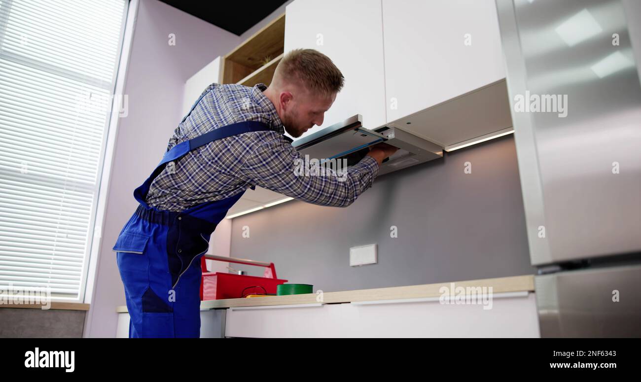 Stove Exhaust Fan Extractor Filter Maintenance And Change Stock Photo