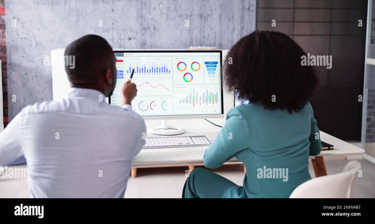 African American Data Analyst Using Data Analytics KPI Dashboard Stock ...