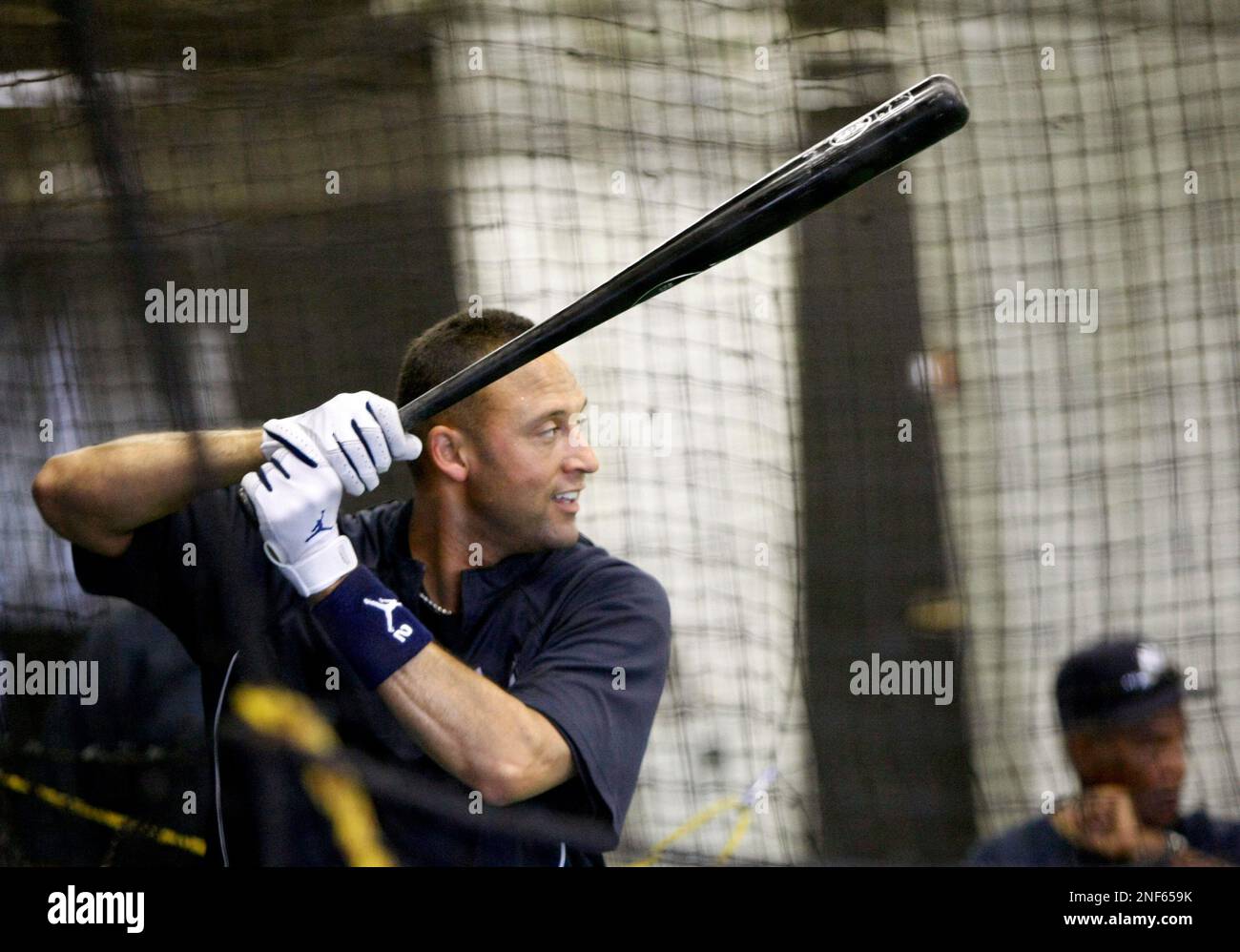New York Yankees Derek Jeter takes live batting practice in the batting  cages on his day off during spring training at Steinbrenner Field in Tampa,  Fla., Tuesday, March 31, 2009. Most of