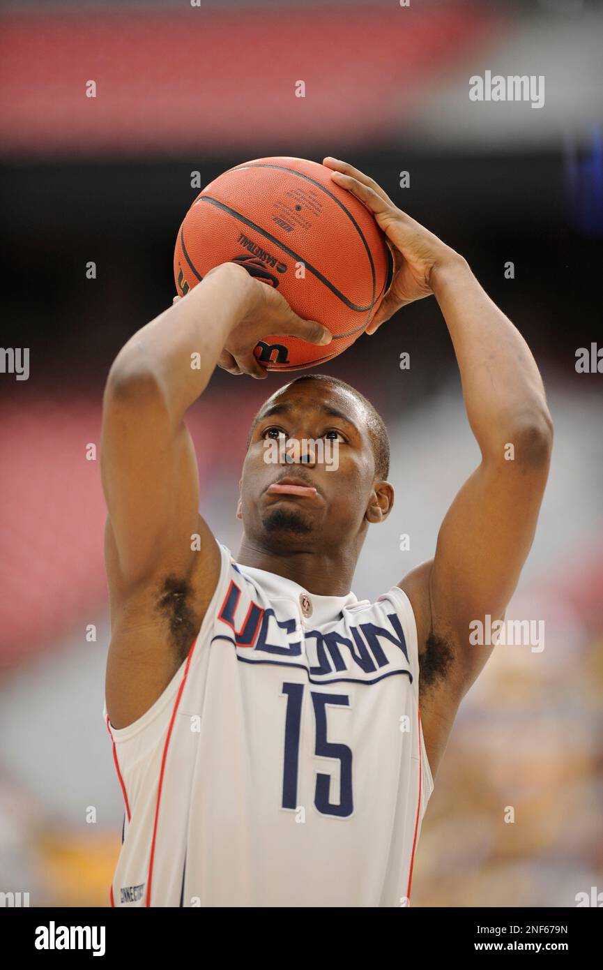 Connecticut's Kemba Walker (15) shoots a foul shot during the first