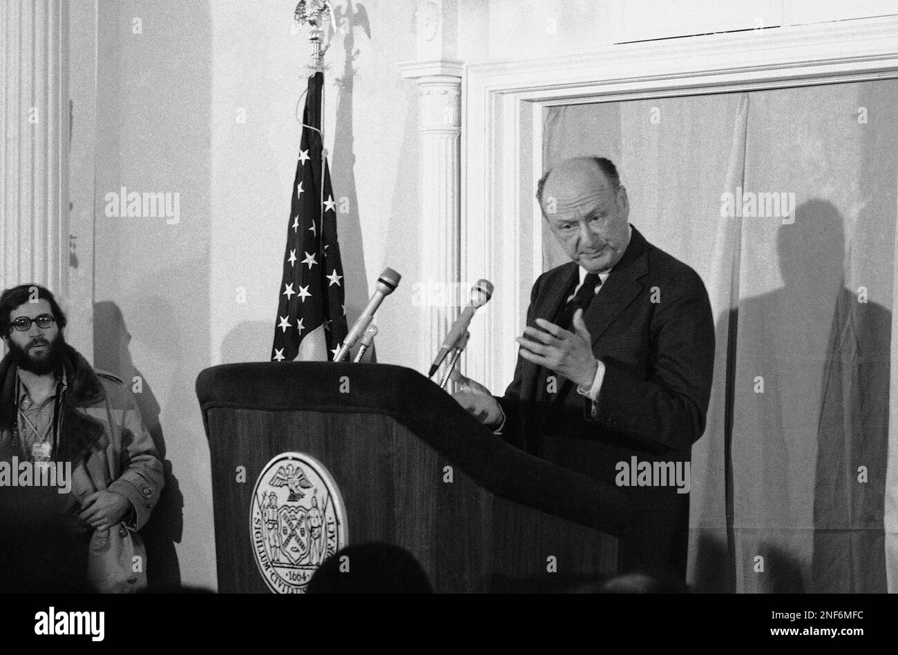 New York City Mayor Ed Koch asks for the next question during a news