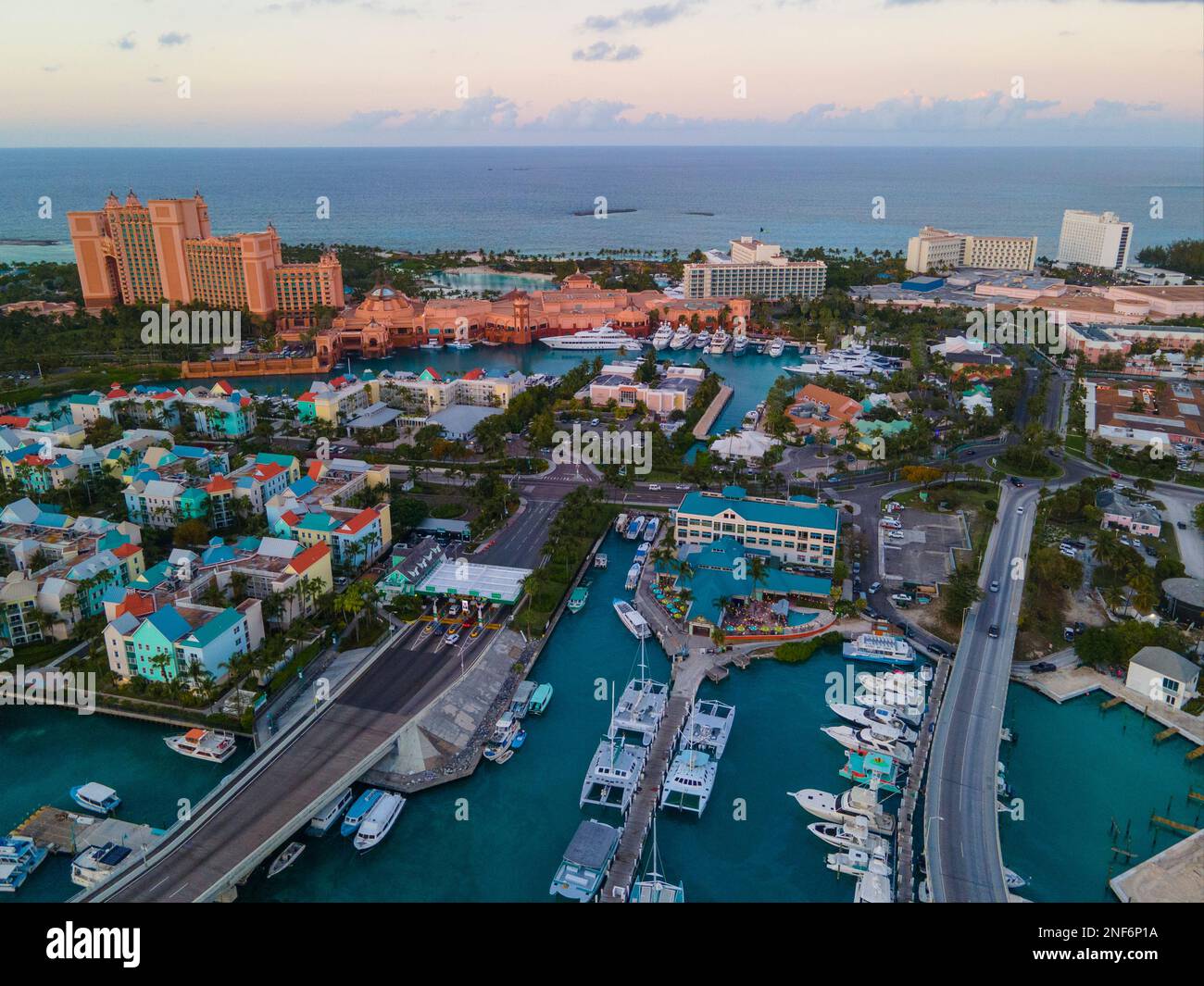 Harborside Villas aerial view at sunset with Atlantis Hotel at the background at Nassau Harbour, from Paradise Island, Bahamas. Stock Photo