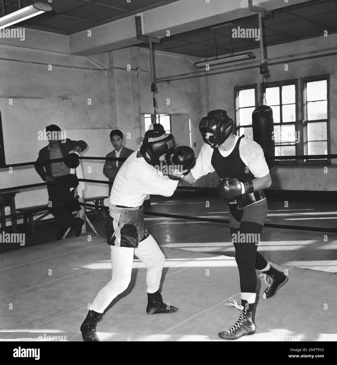 The world lightweight boxing champion Carlos Ortiz, right, of the