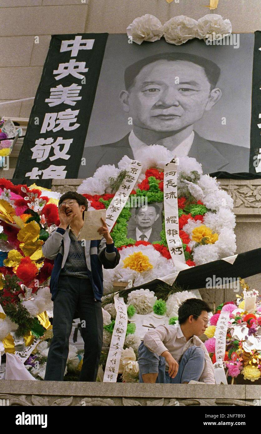 A Chinese Student Reads A Poem Under A Huge Portrait Of Former a-chinese-student-reads-a-poem-under-a-huge-portrait-of-former