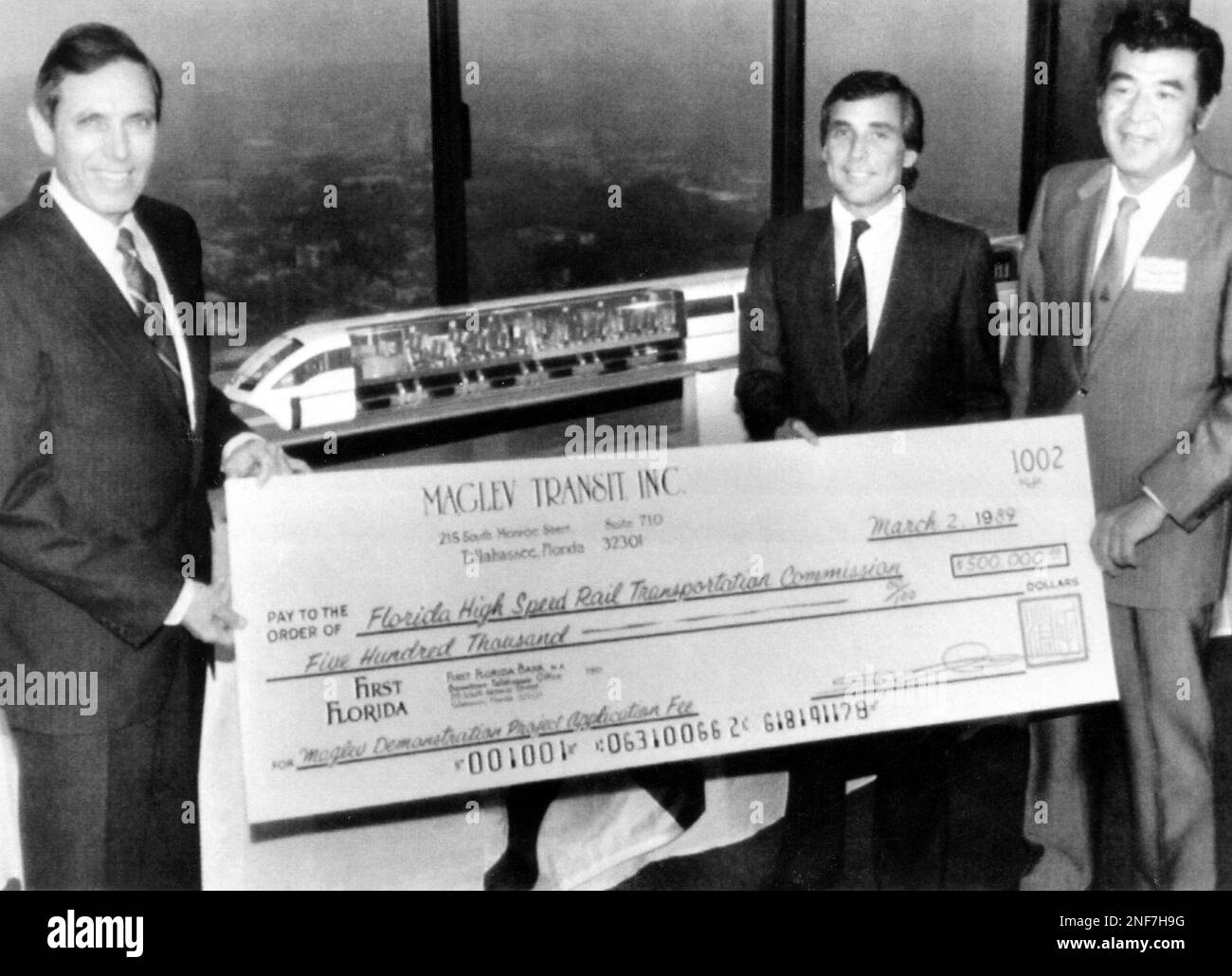 Florida Gov Bob Martinez left - Florida Gov Bob Martinez Left And Florida High Speed Rail Commission Chairman Malcolm Kirschenbaum Center Right Accept A 50000000 Application Fee Check Thursday Mar 2 1989 In Tallahassee Florida From Maglev Transit Inc Chairman Akio Makiyama To Cover Costs To Review Their Megnetic Levitation High Speed Transit System Proposal As Shown In The Model Center Meglevs Transit System Proposal If Accepted Will Mark The Beginning Of The Building Floridas First High Speed Transit System Proposed First For The Orlando Area Ap Photomark Foley 2NF7H9G