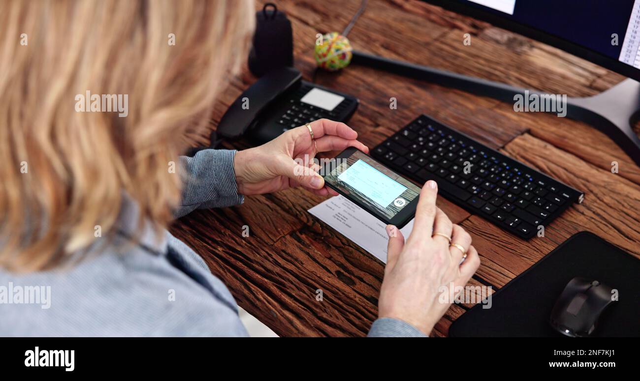 Remote Check Deposit Using Mobile Remote. Online Capture Stock Photo