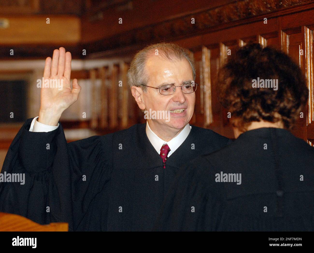 Senior Associate Judge Carmen Beauchamp Cirparick swears-in Judge Jonathan  Lippman ,left, as the state's new chief judge during a swearing-in ceremony  at the New York State Court of Appeals in Albany, N.Y.