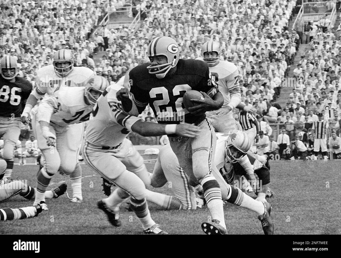 Green Bay Packers Elijah Pitts (22) moves for small gain against Detroit  Lions in a season opener, Sept. 18, 1967, Green Bay, Wisc. Lions Wayne  Walker (55) and some of his buddies