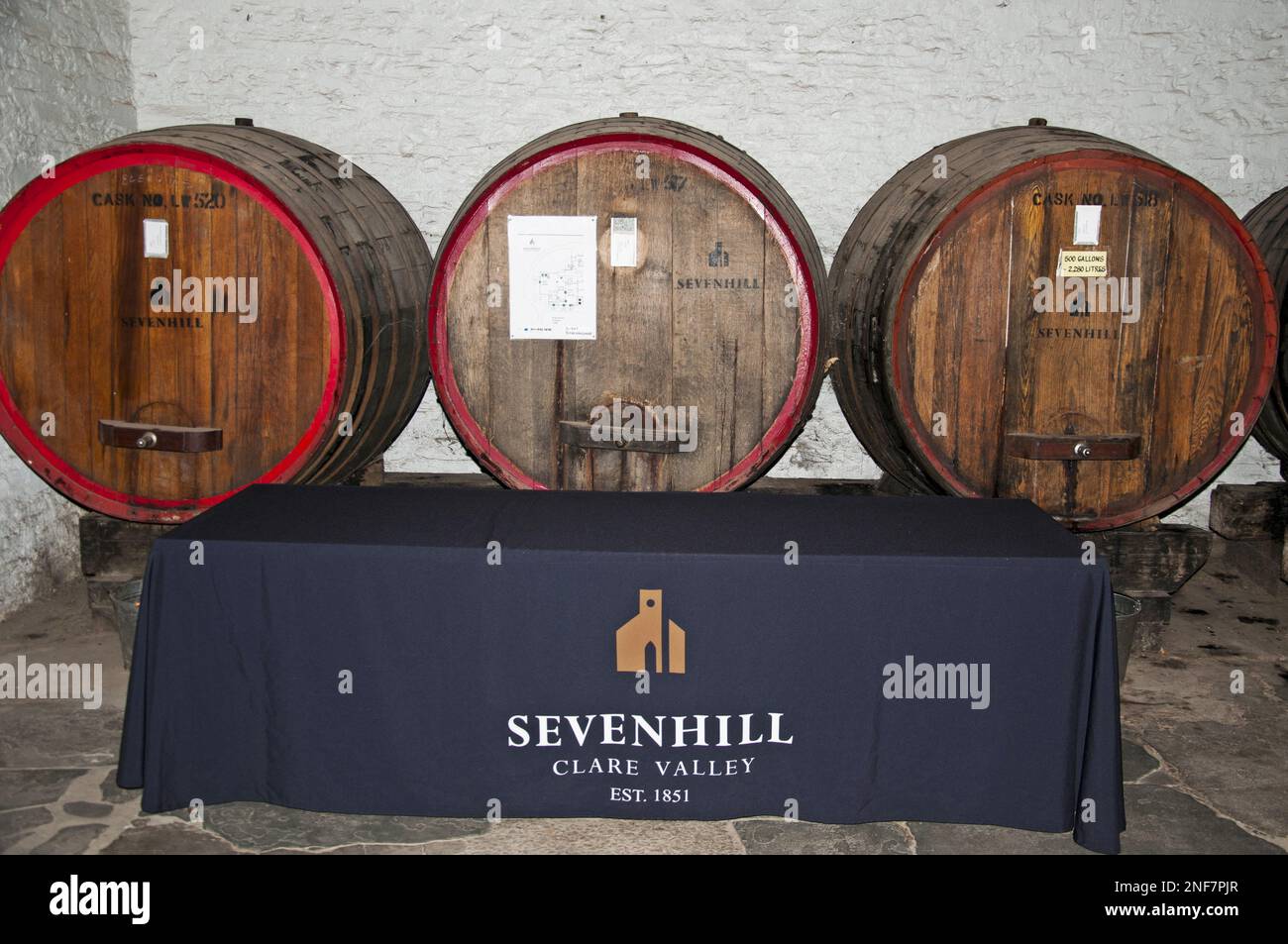 Wine maturing in oak casks at Sevenhill Winery in the Clare Valley of