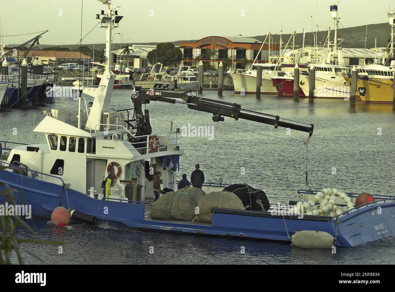 Tuna fishing trawler returning to harbour at Port Lincoln, South Australia Stock Photo
