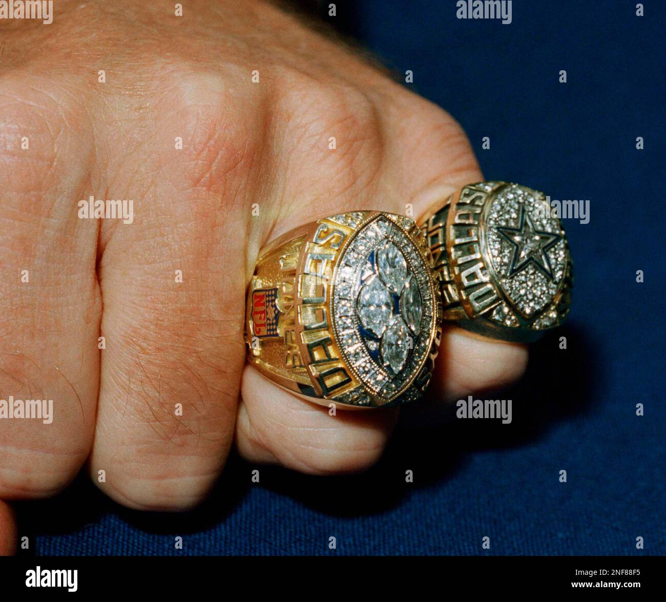 The Dallas Cowboys' Super Bowl XXVIII Championship ring, left, is displayed  with their Super Bowl XXVII ring in Irving, Texas, Monday, July 11, 1994.  The new ring features four large marquis diamonds.