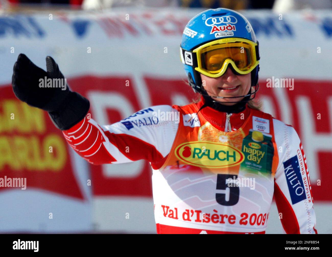 Finland&amp;#39;s Tanja Poutiainen reacts after completing the first run of the ...