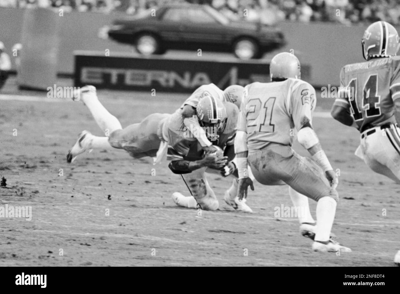UCLA's Avon Riley (9) drags Tony Robinson of Oregon State University to
