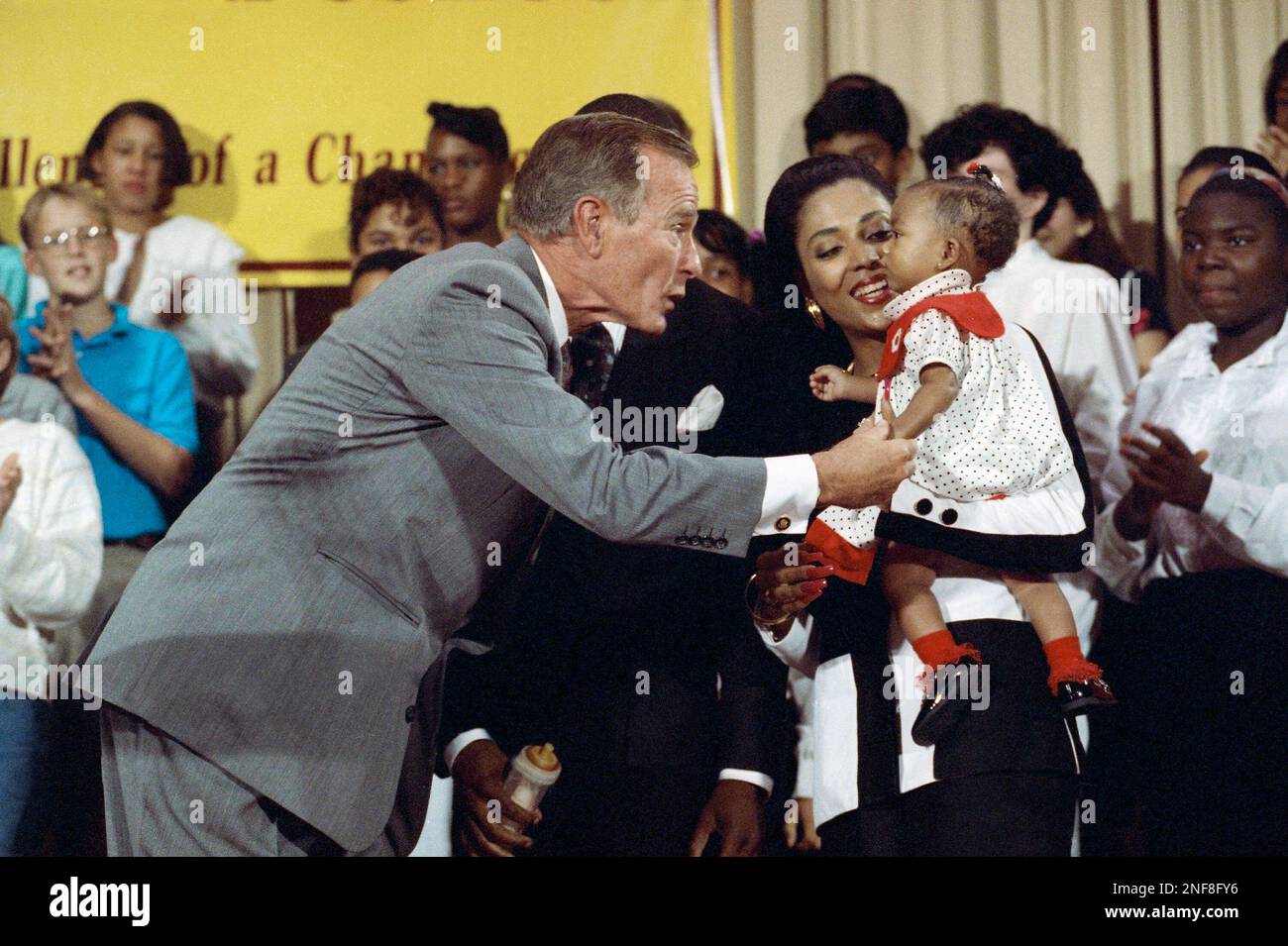 President George Bush greets Olympic gold medalist Florence Griffith