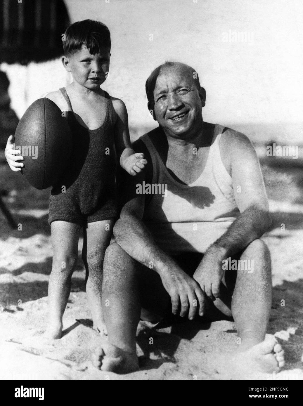 Knute Rockne, famous Notre Dame football mentor is pictured with his ...