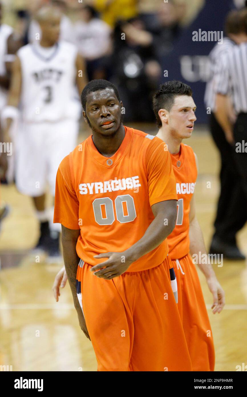 Syracuse's Randy Jackson (00) walks to the bench in front of teamate Andy  Rautins after being called for a foul in the first half of the NCAA college  basketball game against Pittsburgh