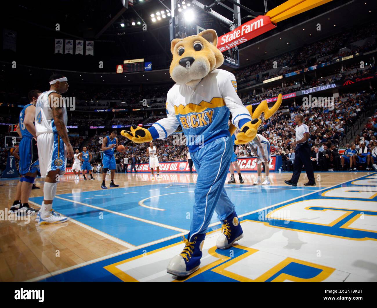 Denver Nuggets mascot Rocky the mountain lion exhorts the crowd as the ...