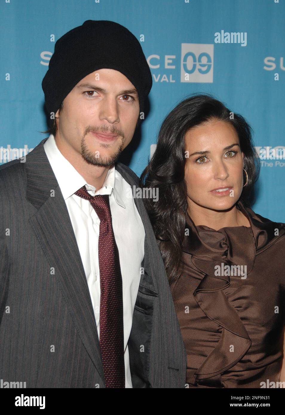 Actors Ashton Kutcher and Demi Moore attend the premiere of "Spread
