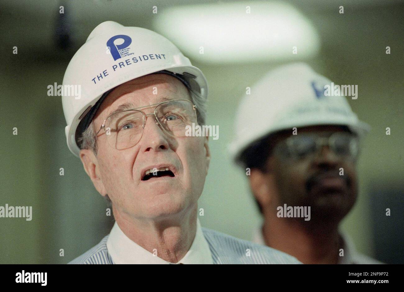 President George Bush tours the Potomac Electric Company's Chalk Point  Generating Station in Aquasco, Md., March 14, 1990. Bush, visiting the power  plant that produces electricity for the White House, acknowledged that