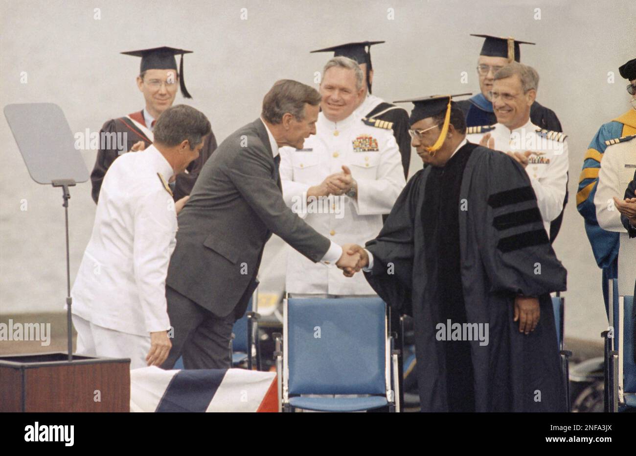 President George Bush greets author and U.S. Coast Guard veteran Alex ...