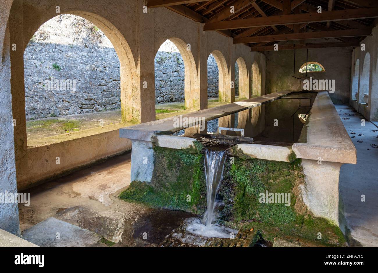 View of the washhouse in the small town of Mazaugues in the Var department, located at the eastern end of the Sainte-Baume massif, in the Provence reg Stock Photo