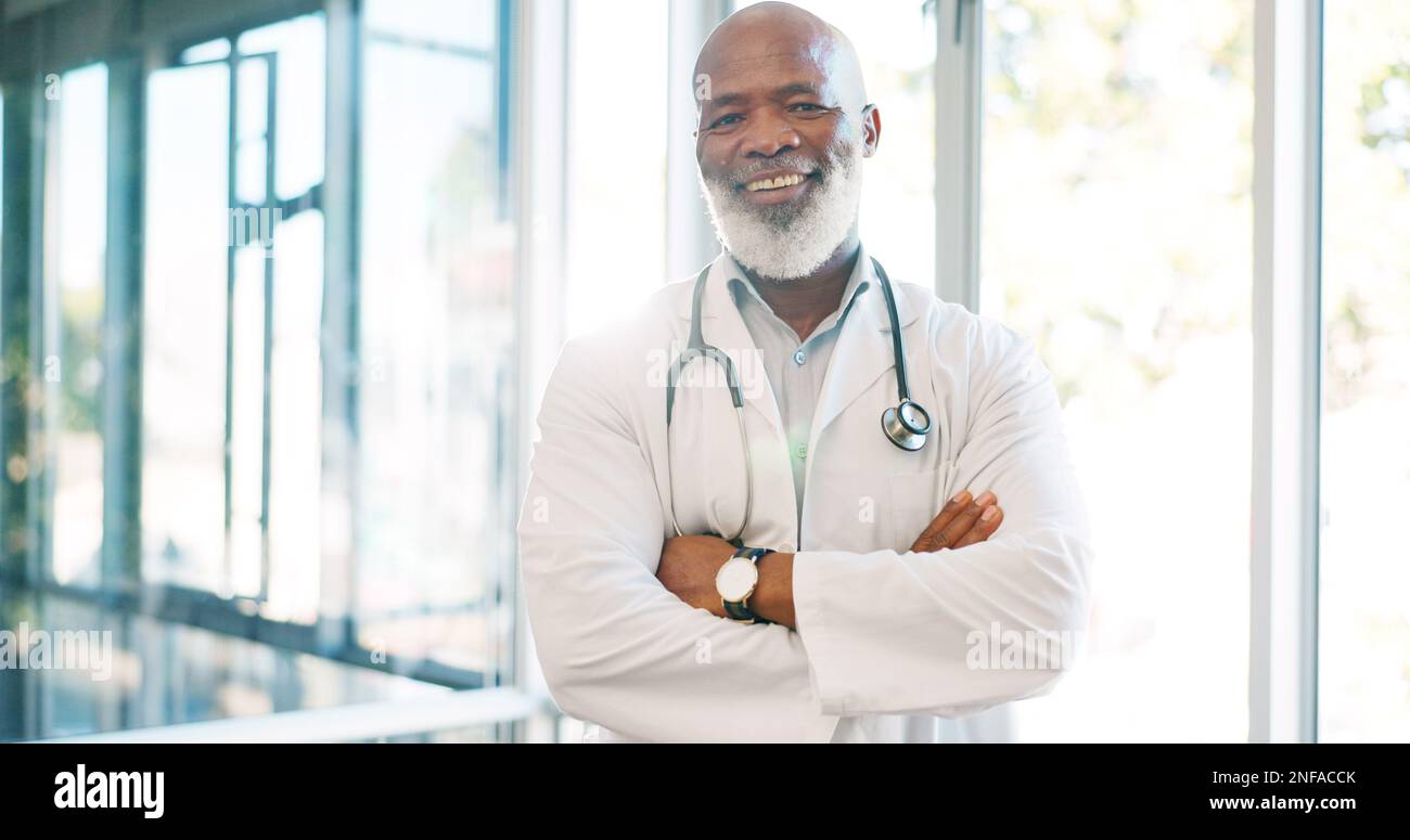 Healthcare worker, face or doctor arms crossed in hospital surgery ...