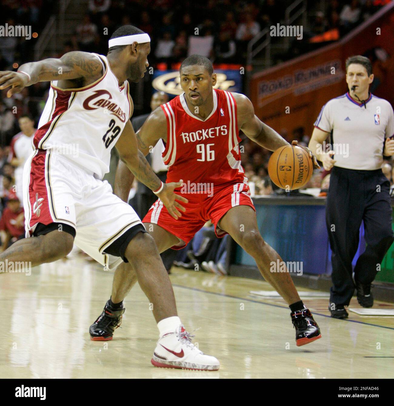 Houston Rockets' Ron Artest (96) tries to get past Cleveland Cavaliers ...