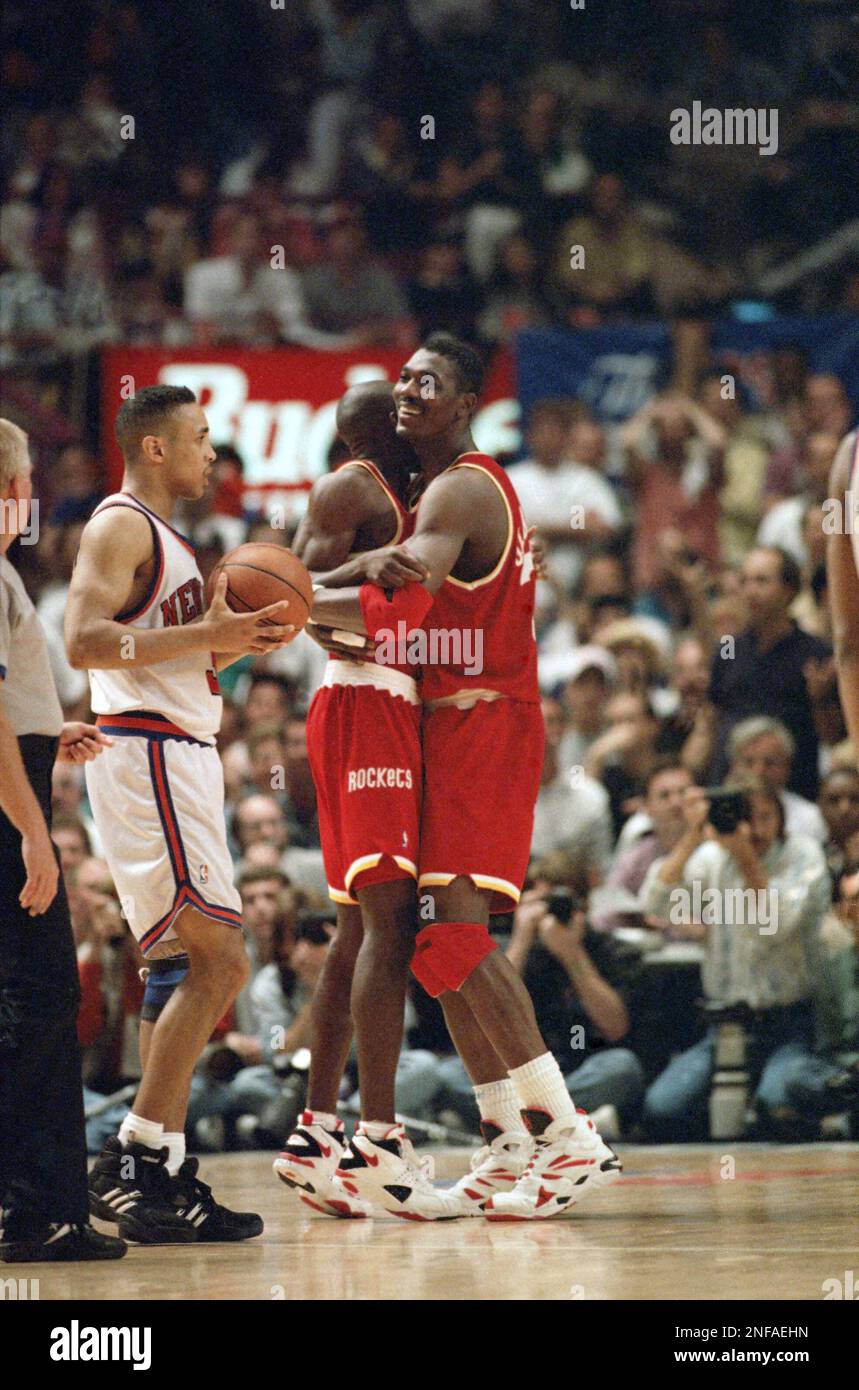Houston Rockets Hakeem Olajuwon, right, and Vernon Maxwell