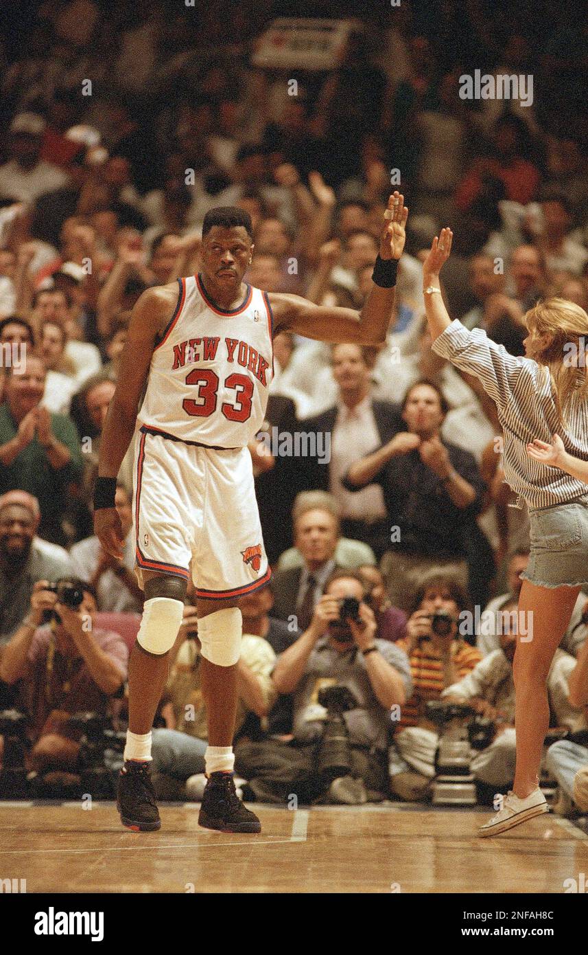 New York Knicks center Patrick Ewing (33) celebrates with New York Knicks center Patrick Ewing (33) celebrates with