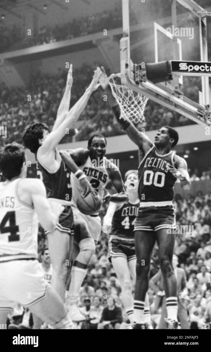 Philadelphia 76ers Moses Malone, white uniform, guard Milwaukee Bucks Bob  Lanier during second quarter NBA Eastern Conference finals action at  Philadelphia, May 18, 1983. (AP Photo/Rusty Kennedy Stock Photo - Alamy